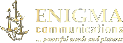 Gold logo of Staffordshire-based Enigma Communications copywriting, publicity, photography agency, featuring three anchors.